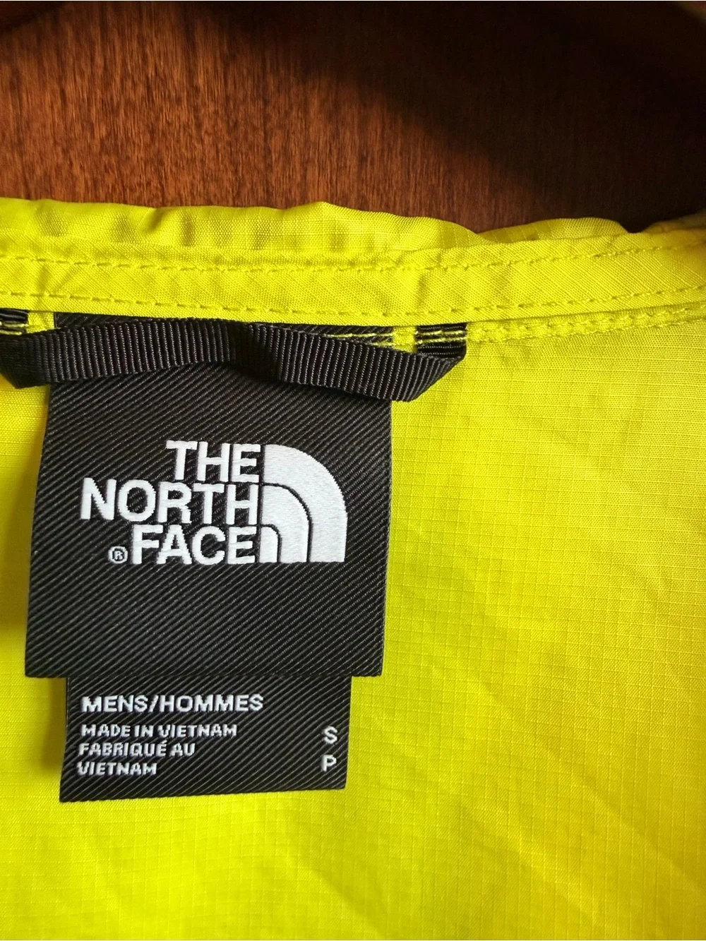 The North Face Yellow & Light Blue Hooded Rain Jacket